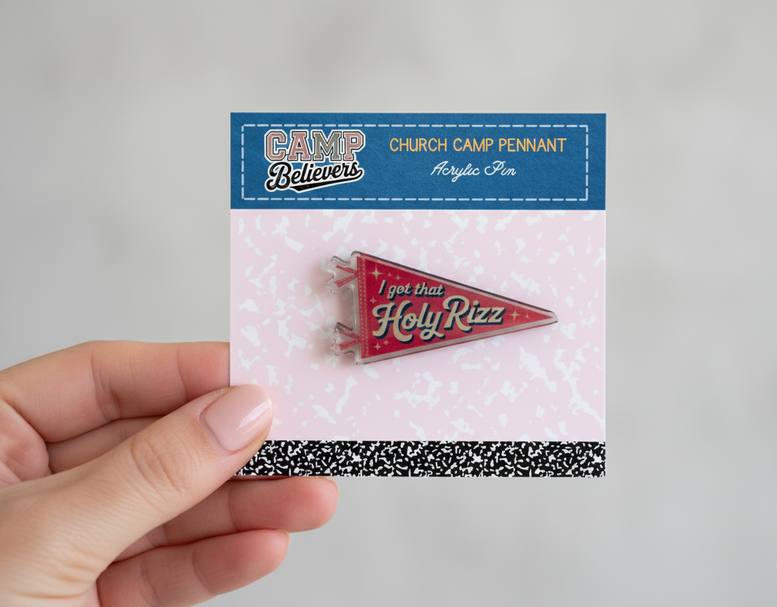 Hand holding a card with a pennant-style pin and text on a light gray background