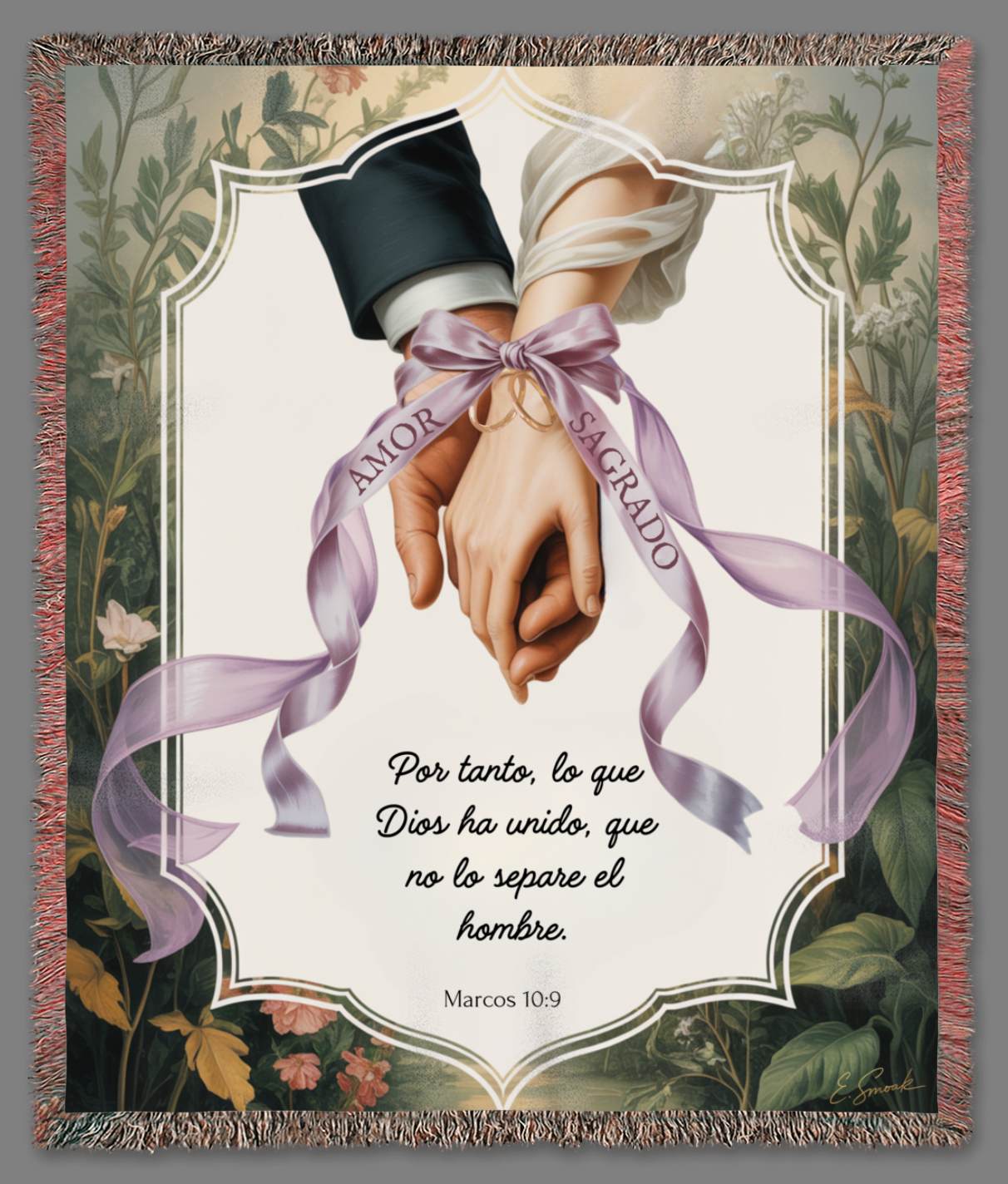 Decorative blanket with a hand holding a ribbon and text, framed by floral designs.