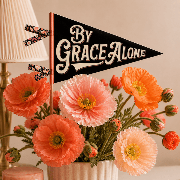 By Grace Alone finished pennant displayed with poppy flowers, Holy Smoak Studios Camp Believers wholesale faith-based product