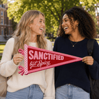 Two women holding finished Sanctified but Spicy pennant outdoors, Holy Smoak Studios Camp Believers wholesale product