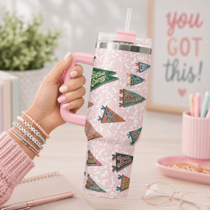 All Hail Camp Believers 40oz tumbler pink handle held in hand, Holy Smoak Studios wholesale faith gift