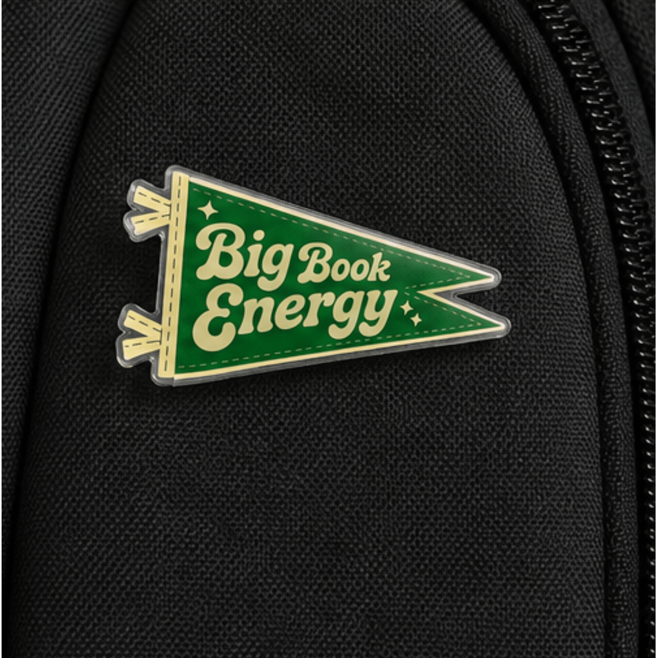 Big Book Energy pennant pin on backpack, Camp Believers Holy Smoak Studios wholesale Christian gift and accessory