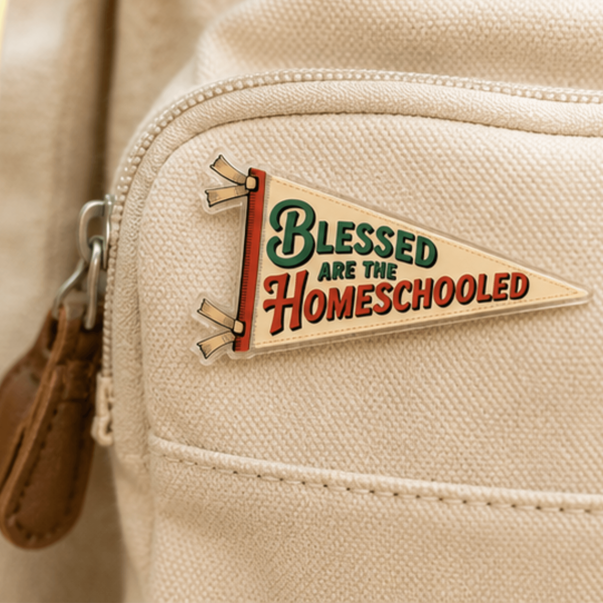 Blessed Are the Homeschooled pennant pin on backpack, Camp Believers Holy Smoak Studios wholesale Christian gift and accessory