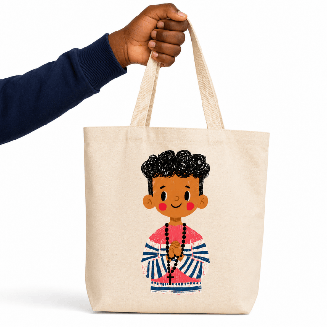 Holy Smoak Studios First Holy Communion Boy Tote Bag Dark Skin Tone with hand displaying bag, wholesale Catholic gift shop tote
