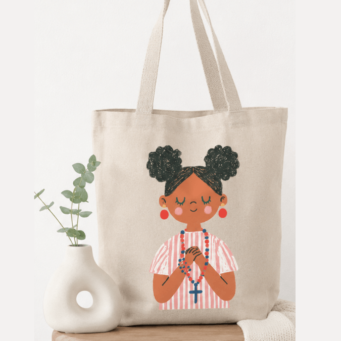 First Holy Communion Girl Tote Bag Dark Skin Tone lifestyle shot, Holy Smoak Studios wholesale Christian gift shop tote bag